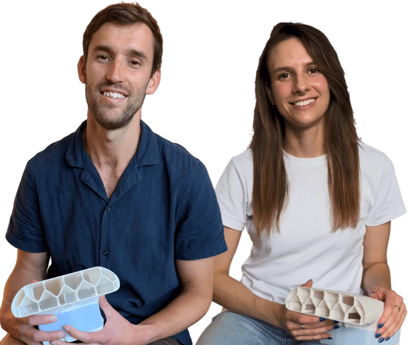 Nick and Kelsie, each holding an early Fantail prototype